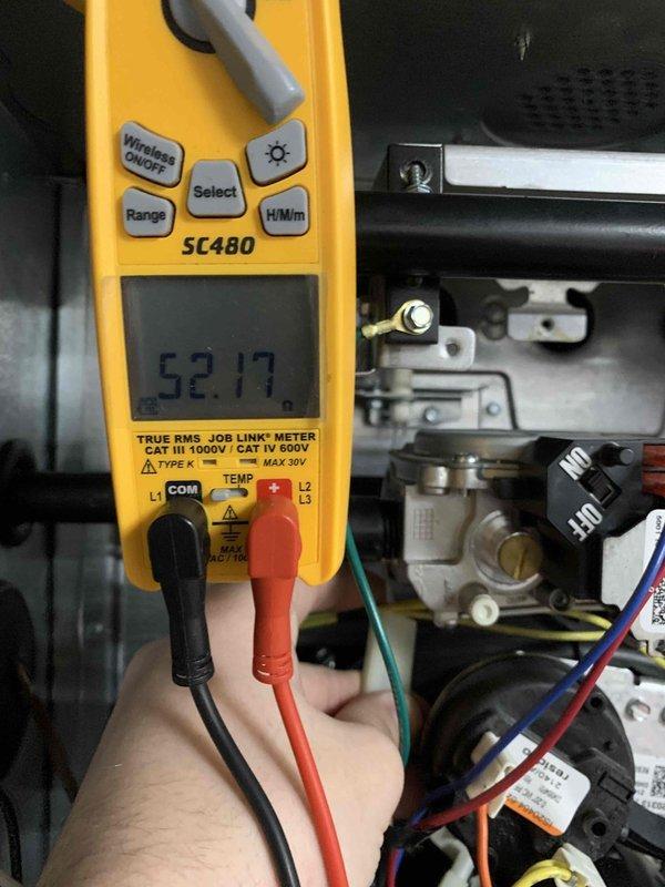 Performed comprehensive heating maintenance service on DZ system as part of recurring member visit. Conducted electrical diagnostics using Fieldpiece multimeter, verifying proper voltage readings (52.17V) across components. All connections were inspected and system operation verified to manufacturer specifications.