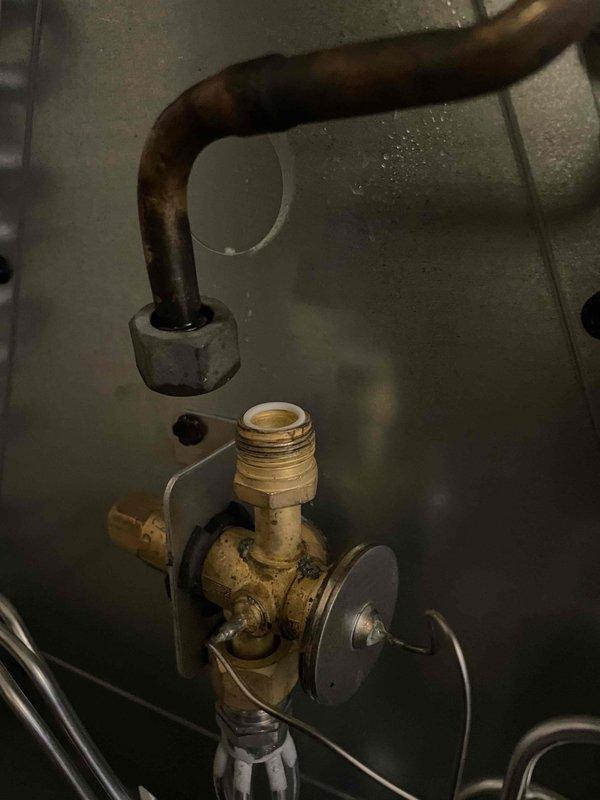 Completed warranty service to replace defective evaporator coil and TXV. Redid all interior fittings to ensure proper connections and system integrity. Found significant debris accumulation at unit base that was cleaned during service to improve system efficiency.