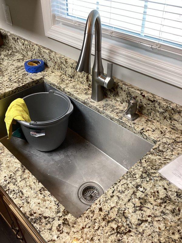 Responded to drainage issue where master bathroom toilet was backing up into shower and basement bathroom toilet was causing sewer odors. Inspected dual grinder pump system (one serving master bathroom, one serving basement) and performed main drain cleanout to restore proper flow and eliminate backup issues. Recommended regular maintenance to prevent future blockages and odor problems.