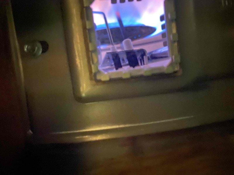 Responded to customer complaint of insufficient hot water. Performed diagnostic inspection of tank water heater, including visual examination of combustion chamber through viewing port. Observed proper blue flame pattern indicating normal gas combustion. Service restored proper hot water function to the unit.