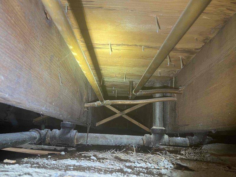 Responded to urgent call for water leak affecting bathroom ceiling. Identified issue with main shut-off valve in plumbing system that customer was unable to operate properly. Accessed crawlspace to inspect pipe network, located and repaired the source of the leak, and demonstrated proper operation of the water shut-off valve to prevent future incidents.