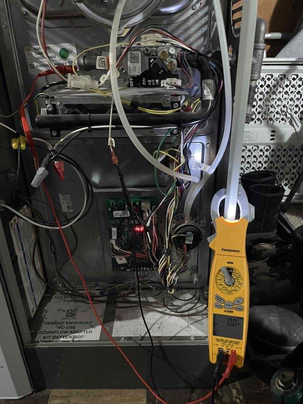 Diagnosed furnace ignition failure due to E22 error code on Emerson control board. Performed electrical testing with Fieldpiece multimeter on board components and wiring connections. Resolved issue and verified proper furnace operation through complete heating cycle test.