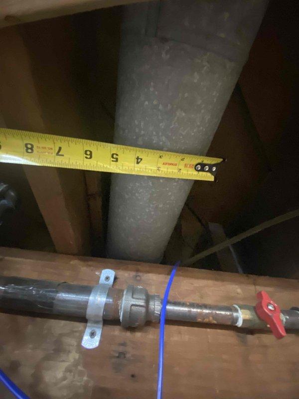 Measured and inspected existing HVAC ductwork system in basement area for the addition of a new supply run. Evaluated the 6-inch insulated main duct and surrounding infrastructure to determine optimal connection point for the new AH branch line. Documented existing conditions including clearance requirements and potential routing through joists to complete the requested ductwork extension.