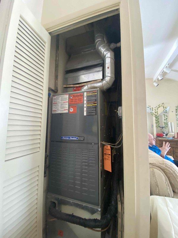 Completed warranty replacement of heat exchanger in American Standard furnace. Installed new ductwork with proper insulation and secured all connections. System is now operational with proper ventilation through the metal exhaust pipe system.