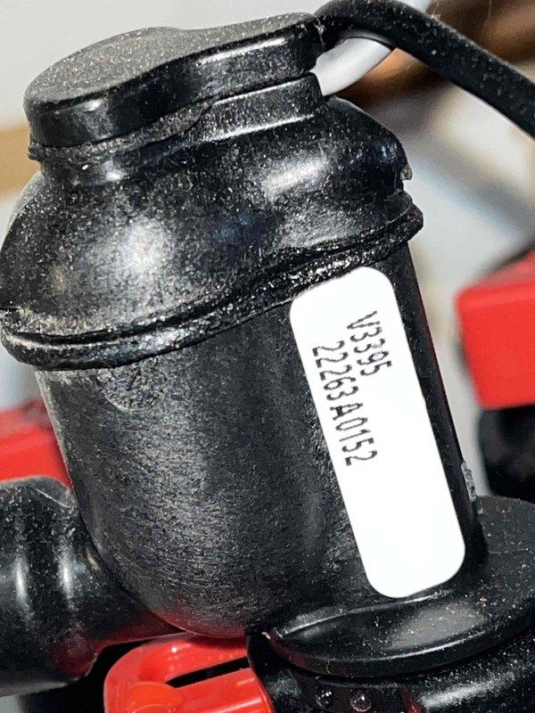 Inspected water softener system that was leaking onto floor with salt solidification issues. Identified and replaced faulty black valve assembly with damaged red gasket at connection point. Verified proper operation after repair and confirmed system is now functioning correctly on dedicated electrical circuit.