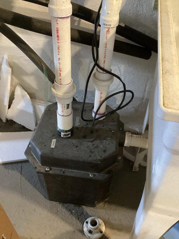 Investigated customer complaint of loud noise from existing sump pump during operation termination. Inspection revealed normal pressure reading of approximately 30-35 PSI on the system gauge. Determined noise is characteristic of this particular model and not indicative of mechanical failure or improper installation.