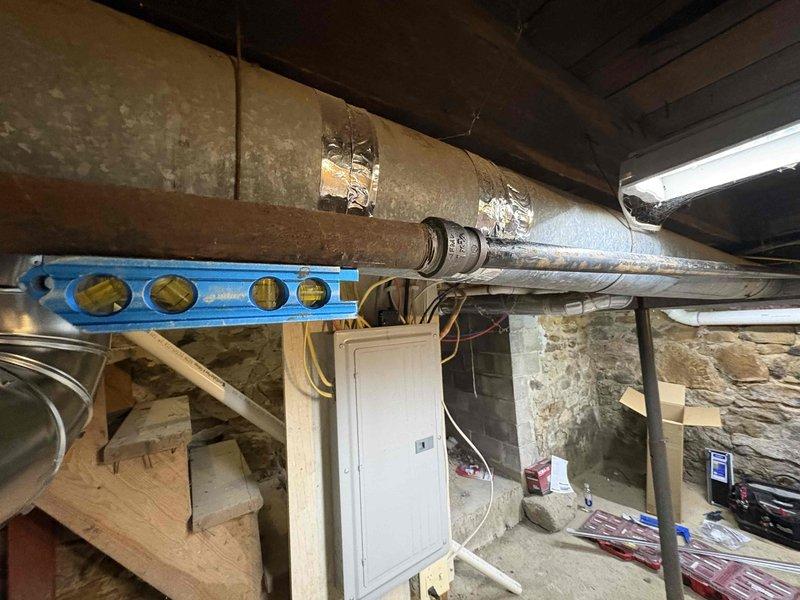 Completed gas piping installation for HVAC system by connecting to existing 1" gas line and extending approximately 15 feet to furnace location. Performed pressure test on the above-ground line to verify system integrity and ensure compliance with safety standards.