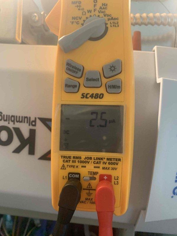 Performed heating maintenance on member's system. Conducted electrical testing with multimeter showing 2.5 reading and inspected control board which displayed "EP2" error code. Documented diagnostic findings with photos of electrical components and control board wiring connections.
