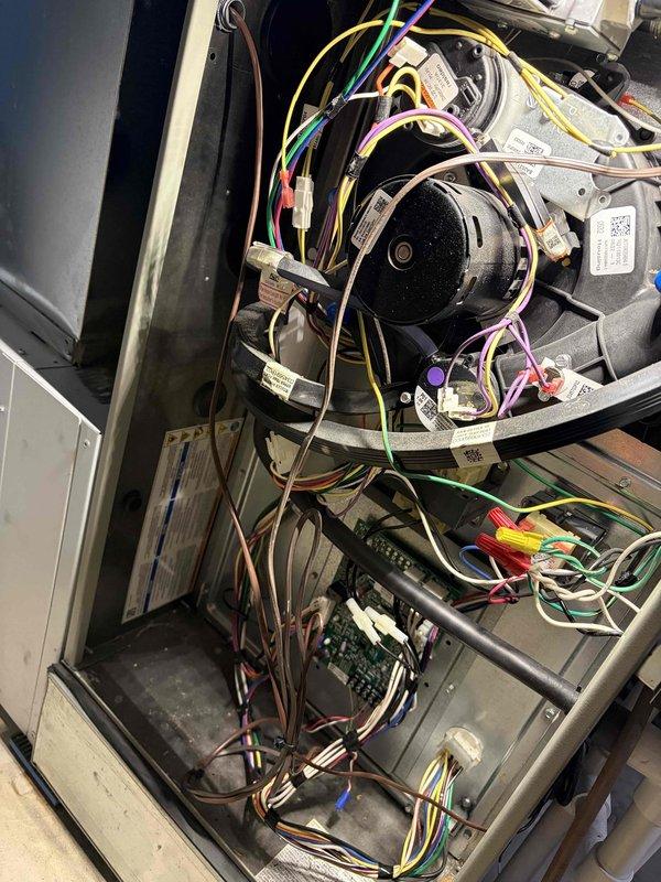 Returned to replace warranty blower motor in HVAC system. Documented electrical connections and component configuration with photos prior to removal. New motor has been ordered through supplier with delivery expected tomorrow; customer was instructed to return the three space heaters upon completion of repair.