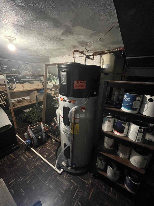 Inspected newly installed 80-gallon hybrid water heater (installed 3/2024) due to customer complaint of insufficient hot water. Visual inspection showed proper installation with copper piping connections. Unit appears to be functioning correctly, but customer may need adjustment to energy-saving settings to optimize hot water production for household demands.