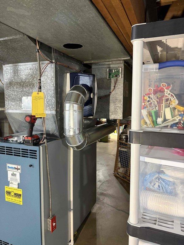 Responded to warranty call for humidifier move control issue. Accessed and inspected HVAC system in basement utility area, focusing on the connection between furnace unit and ductwork. Successfully restored proper functionality to humidifier control system as per warranty requirements.
