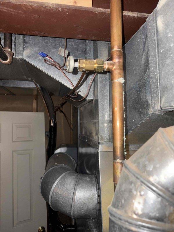 Performed diagnostic assessment on 50-gallon gas water heater (non-power vented, 10-12 years old) that was experiencing extended reheat times. Identified significant corrosion on heat exchanger and deteriorated insulation around exhaust components. Repaired damaged section of flue vent and replaced thermocouple to restore proper heating functionality.