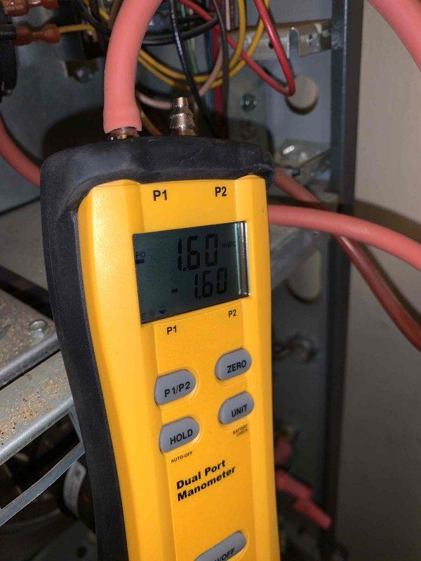 Responded to no heat call for gas furnace installed in 10/2020. Diagnostic testing with dual port manometer revealed gas pressure readings of 1.60" WC inlet and -7.6" WC at the manifold. Adjusted thermostat from 59° to appropriate heating setpoint, restoring normal furnace operation.