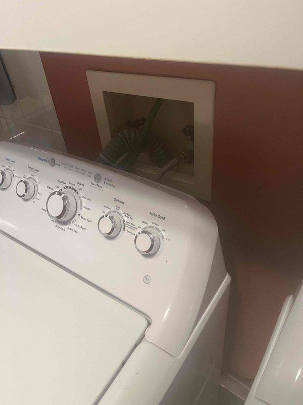 Installed new water shut-off valves and pressure reducing valve (PRV) for washing machine supply lines in recessed wall box. Verified proper operation of valves and checked for leaks after installation. System now functioning correctly with appropriate water pressure for appliance operation.