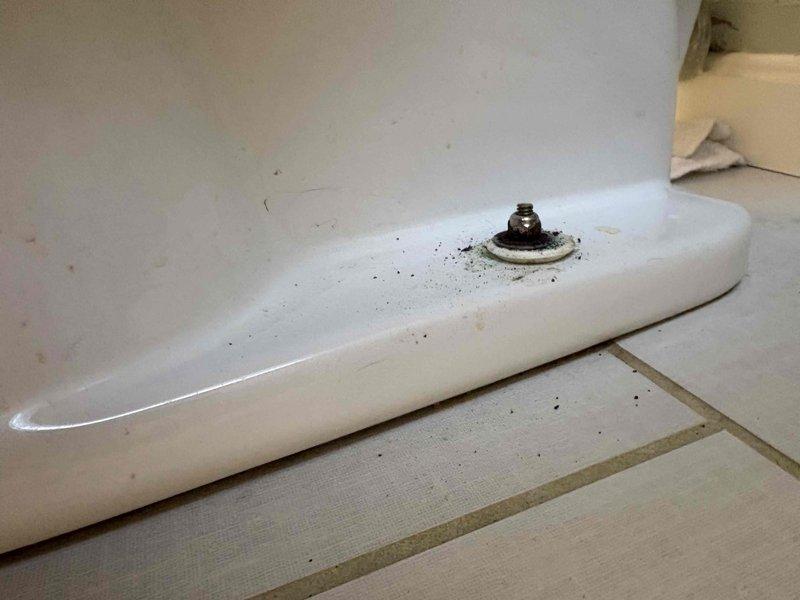 Returned to complete installation of customer-supplied toilet. Inspected internal tank components including flush valve, flapper, and fill valve - all in proper working condition. Secured toilet base to floor with mounting bolts and verified no leaks at connections.