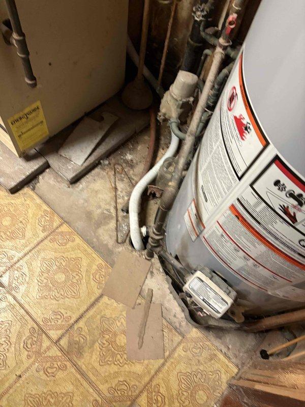 Responded to service call regarding buzzing sound from pump furnace. Conducted visual inspection of water heater setup and surrounding plumbing infrastructure including PVC and copper piping connections. Documented condition of equipment and identified source of noise for further assessment.
