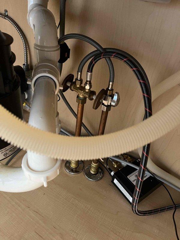 Replaced main water shut off valve and repaired dishwasher hot water shut off valve under sink. Verified proper operation of all installed components with no leaks present at connections.
