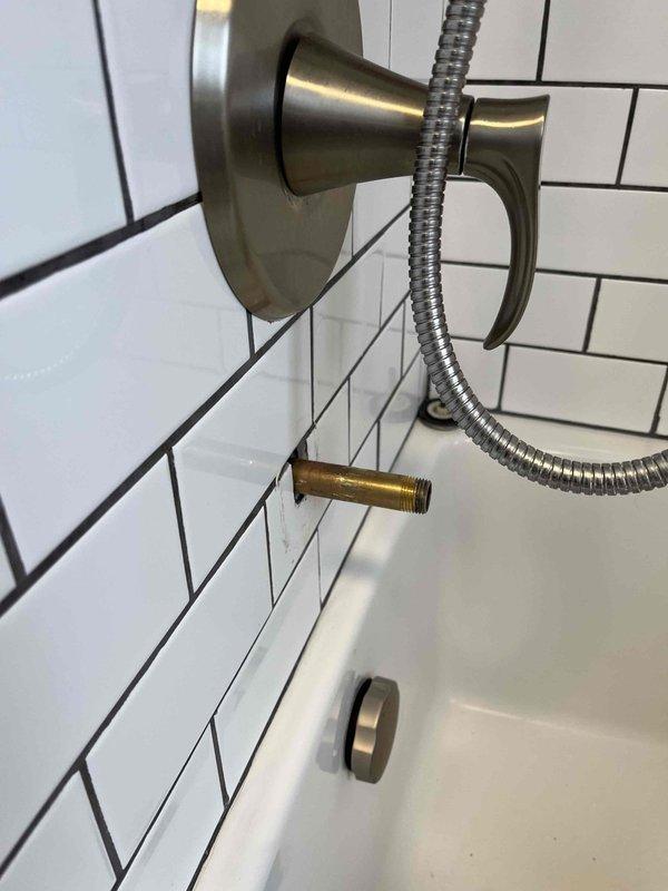 Identified and repaired shower leak within wall cavity. Removed section of drywall to access plumbing infrastructure, revealing water intrusion around shower diverter valve connection. Replaced damaged valve fitting and verified proper operation with no further leakage before closing access point.