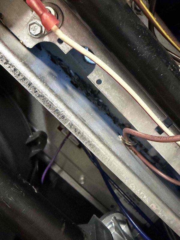 Responded to heating malfunction call and discovered dirty filter causing airflow restriction. Installed new 25 x 2 filter and inspected electrical connections, finding evidence of fluid leakage on terminal connections. Cleaned electrical contacts and restored proper heating operation.