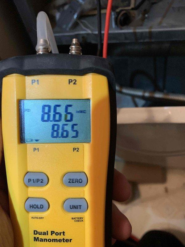 Responded to no-heat complaint where furnace was running but not firing. Performed diagnostic testing using dual port manometer (readings at 8.66/8.65 inWC) and Fieldpiece SC480 multimeter (25.9V reading) to identify issue. Restored heating functionality by addressing gas pressure and electrical components.