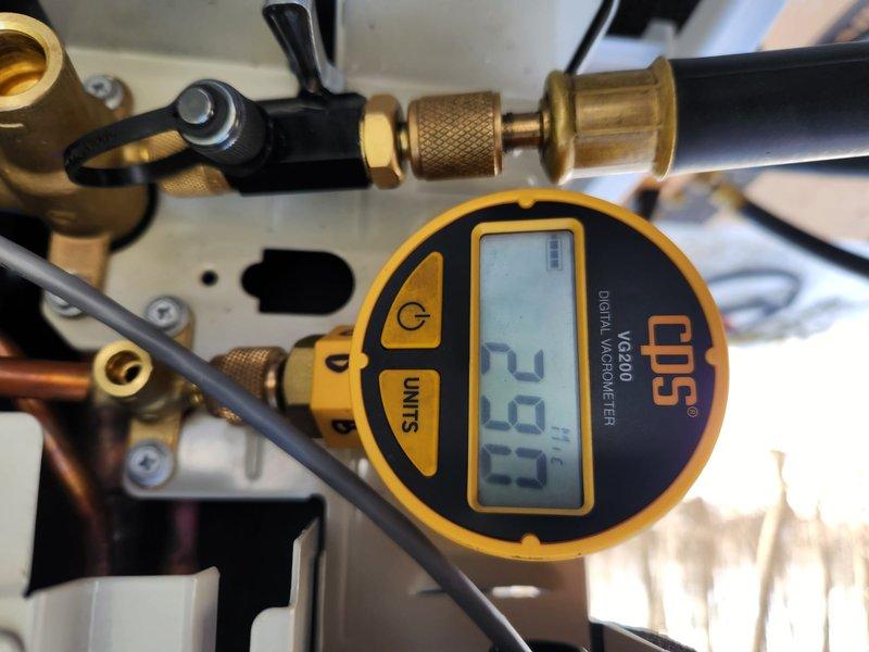 Completed heat pump installation as scheduled. Performed vacuum testing with CPS VG200 Digital Vacuum/Micron Meter, achieving 29.7" Hg vacuum initially, then pulling down to 287 microns to ensure system integrity. All connections properly sealed and system commissioned according to manufacturer specifications.