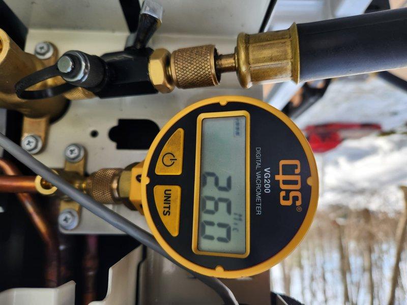 Completed heat pump installation as scheduled. Performed vacuum testing with CPS VG200 Digital Vacuum/Micron Meter, achieving 29.7" Hg vacuum initially, then pulling down to 287 microns to ensure system integrity. All connections properly sealed and system commissioned according to manufacturer specifications.