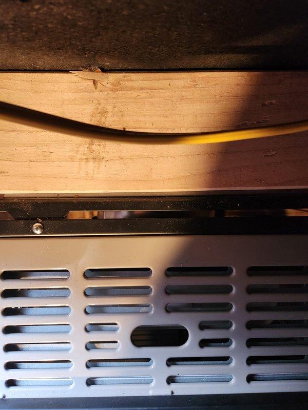 Returned to complete gas line installation for previously serviced unit. Inspected existing ventilation system, ensuring proper connection of gas supply line to HVAC equipment. Verified secure mounting of ventilation components to wooden structural framing and confirmed appropriate routing of electrical wiring alongside the installation.