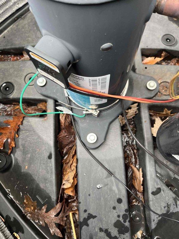Returned to complete sold repair work, installing the air scrubber UV bulb as planned. Inspected outdoor unit and documented debris accumulation inside housing that requires cleaning. Crank case heater installation pending due to parts availability; will schedule follow-up once component arrives.