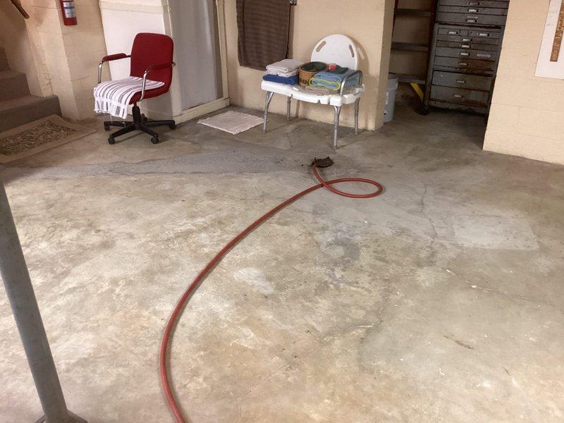 Performed lead rotation service on aged boiler system (approximately 30-40 years old). Switched lead function from Bruno unit to maintain proper operational sequence. System located in basement with exposed ceiling structure and concrete floor.