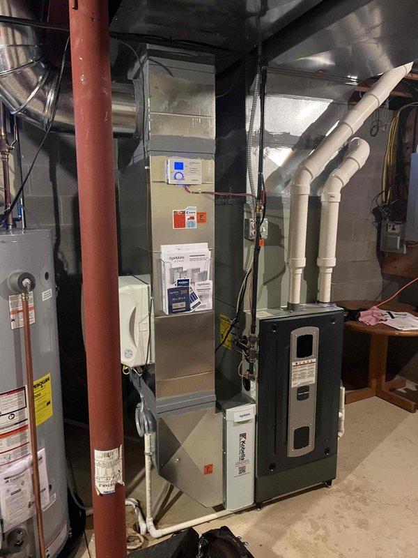 Performed annual heating maintenance on air handler system. Inspected and replaced air filter with proper diamond-patterned mesh filter. Examined furnace components, including control panels, ventilation system, and PVC exhaust pipes, confirming all connections and electrical wiring are secure and functioning properly.