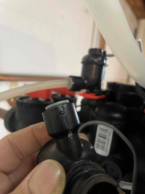 Successfully completed the scheduled return service to replace a chlorine generator system. Removed the existing unit and installed the new black plastic assembly with multiple connection points, ensuring proper integration with the existing plumbing. System was thoroughly tested after installation and is now functioning as intended.