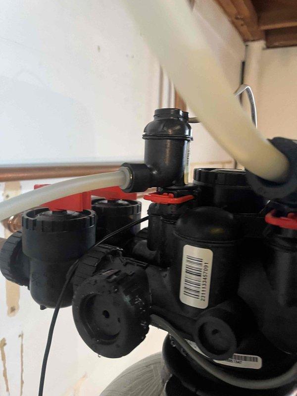 Successfully completed the scheduled return service to replace a chlorine generator system. Removed the existing unit and installed the new black plastic assembly with multiple connection points, ensuring proper integration with the existing plumbing. System was thoroughly tested after installation and is now functioning as intended.