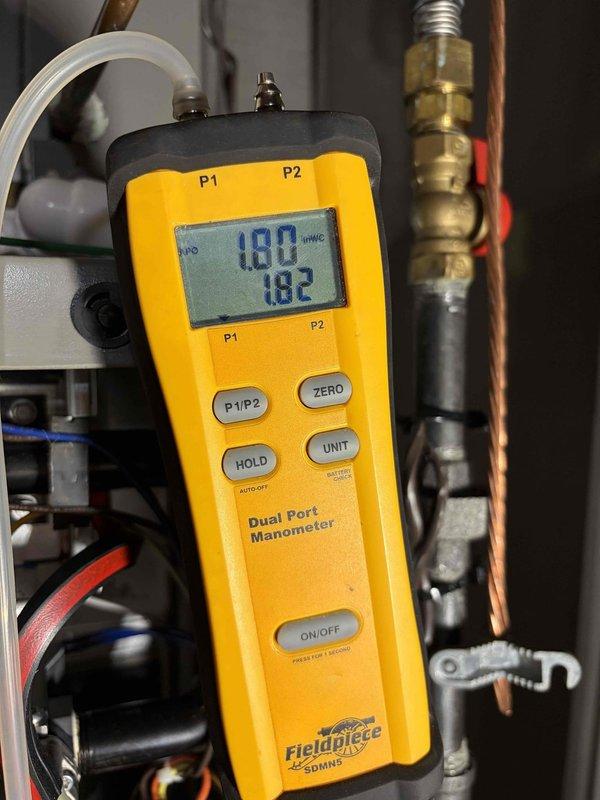 Performed scheduled heating maintenance on dual zone system. Used digital manometer to verify proper gas pressure readings between 180-352 inWG across both zones. All measurements within manufacturer specifications, ensuring optimal system operation and efficiency.