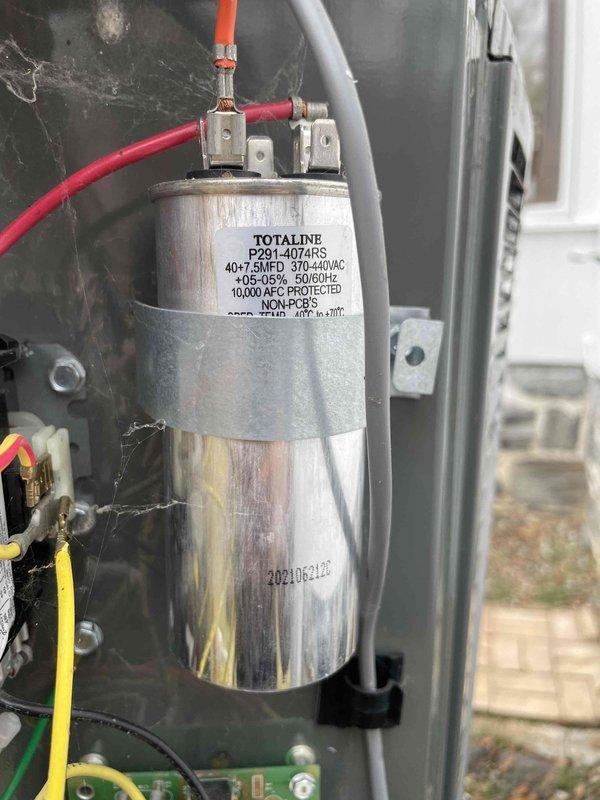 Performed comprehensive tune-up on 2-year-old 5-ton Trane HVAC system after customer reported high energy bills and heating issues with auxiliary heat not turning off. Inspected and verified capacitor (TOTALINE P291-4074RS 40+7.5MFD) was functioning within specifications and cleaned minor dust accumulation from internal components to improve system efficiency.