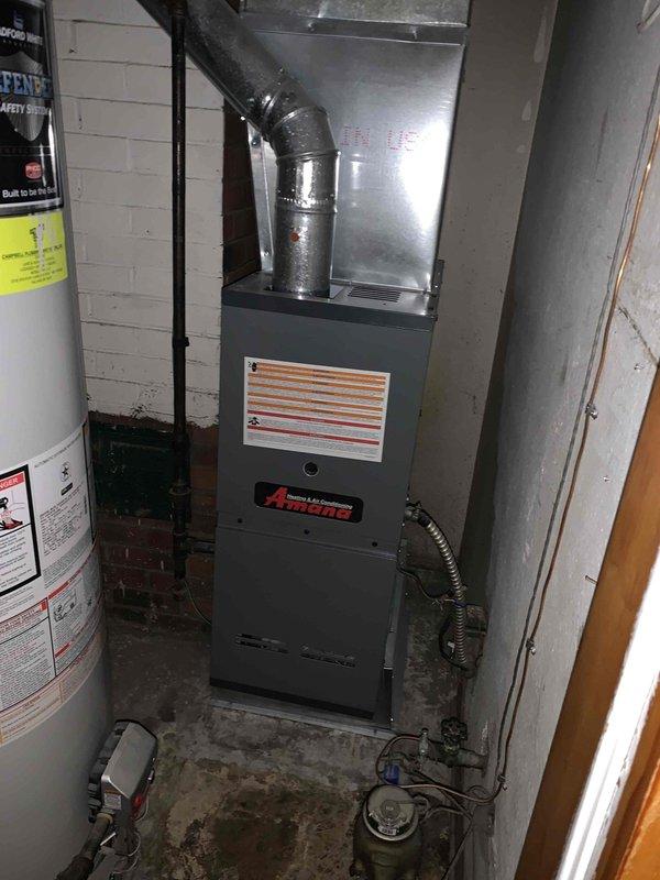 Performed service call for non-functioning thermostat. Inspected Honeywell digital thermostat displaying 72°F and verified proper level using Milwaukee level tool. Examined Amana furnace unit and associated ductwork, confirming electrical connections and condensate removal system were operational. Thermostat functionality was successfully restored.