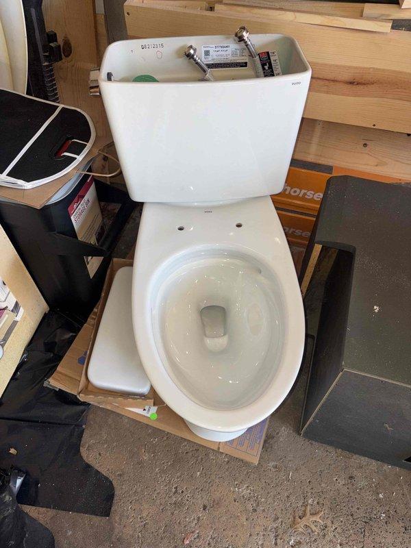 Removed existing wall mount toilet flange and installed new floor mount flange with necessary modifications to the main stack piping. Completed installation of customer-provided Toto elongated toilet, ensuring proper connection to the newly adapted waste line system.