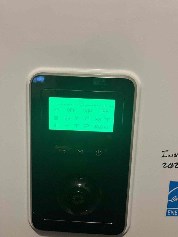 Responded to no hot water complaint involving a system with digital thermostat/controller. Inspected unit displaying "DHW: OFF" status with pressure reading of 48.8 PSI. Verified temperatures at 70°F/68°F and 69°F/63°F at separate control points. Reactivated domestic hot water function and confirmed proper operation before departure.