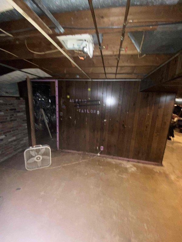 Performed assessment of non-functional 44-year-old furnace per homeowner's replacement request. Conducted visual inspection of the basement installation area with exposed ductwork and utility connections. Documented existing system configuration and site conditions for replacement quote preparation.