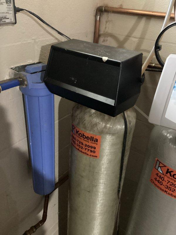 Completed club membership sign-up and inspection of water treatment system. Noted UV light and RO filters may require replacement due to system inactivity over several months. Documented Kobella water filtration system and NAPCO water heater installation with photographs for service record.