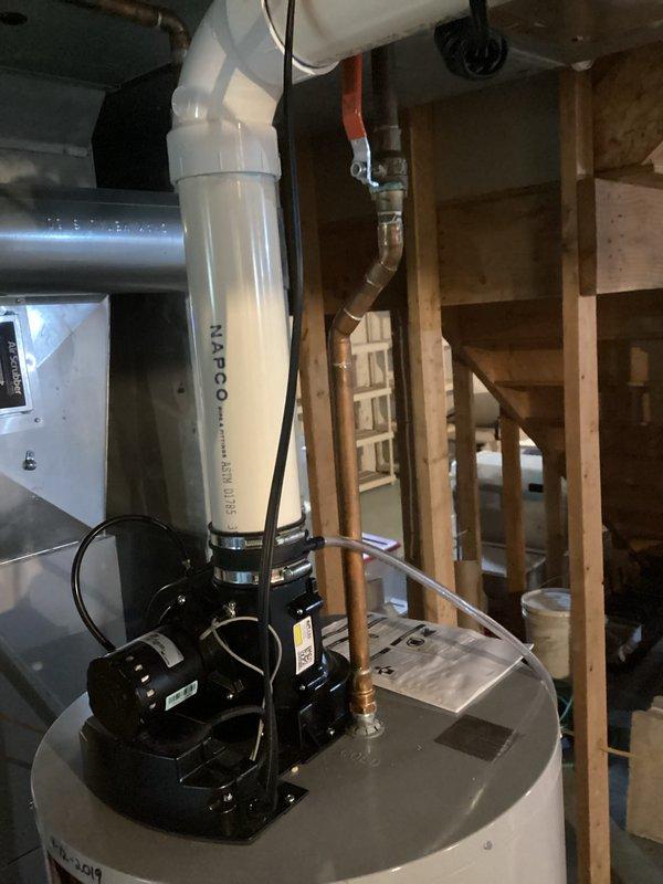 Completed club membership sign-up and inspection of water treatment system. Noted UV light and RO filters may require replacement due to system inactivity over several months. Documented Kobella water filtration system and NAPCO water heater installation with photographs for service record.