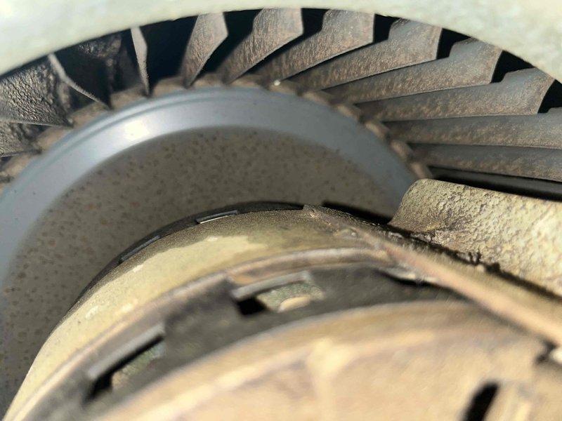 Performed diagnostic assessment on 30-year-old electric furnace, documenting significant wear on blower assembly with dust accumulation on fan impeller and housing. Identified deterioration of internal wiring and mechanical components. Consultation scheduled to review replacement options.