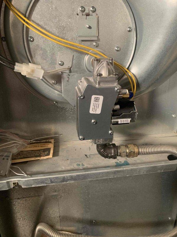 Replaced defective gas valve in HVAC system as part of sold repair service. Identified leak at brass pipe fitting with visible water stains on collection pan. New parts ordered and scheduled for installation Wednesday with 2-hour labor allocation.