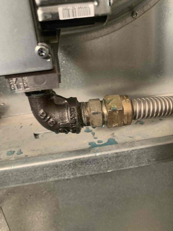 Replaced defective gas valve in HVAC system as part of sold repair service. Identified leak at brass pipe fitting with visible water stains on collection pan. New parts ordered and scheduled for installation Wednesday with 2-hour labor allocation.