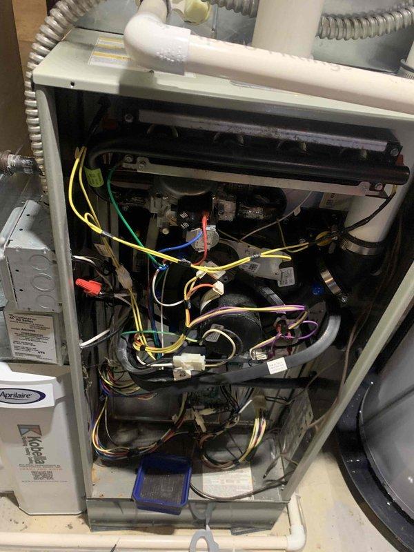 Responded to no heat complaint for Kobella furnace system under 10 years old. Customer reported possible gas odor earlier. Upon inspection, found faulty ignition control module causing system failure. Replaced ignition module, verified proper gas valve operation, and tested system through complete heating cycle. All connections were secured and system is now functioning correctly with no gas leaks detected.