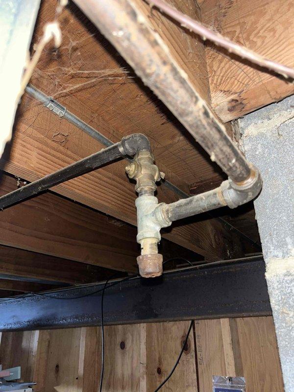 Replaced two broken gas valves: one located behind the stove and another in the basement. Conducted pressure test after valve replacement to verify system integrity and absence of leaks.