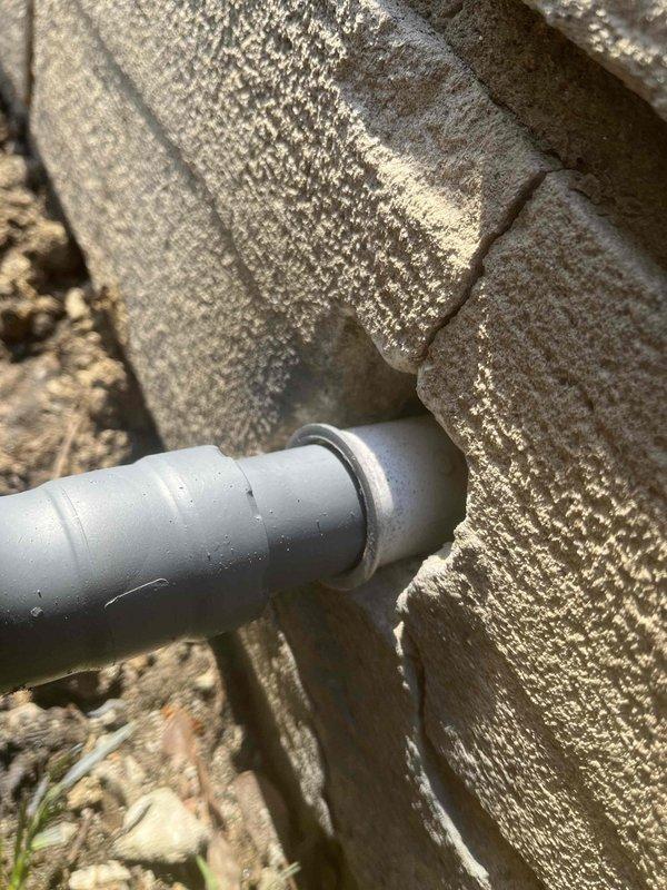 Returned to property to complete gas line repair in crawl space as previously sold. Verified proper connection of PVC pipe through concrete structure, with no visible damage or leakage at connection points. Performed pressure test on system, confirming normal operating pressure of approximately 25 PSI.