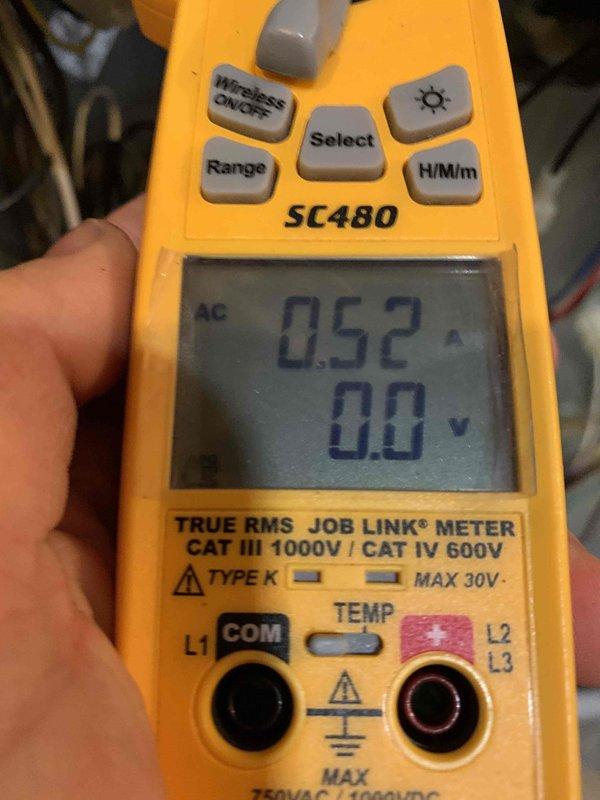 Performed routine tune-up on air handler unit, discovering significantly clogged air filter which was restricting system airflow. Electrical testing with SC480 clamp meter confirmed system drawing 0.52A with normal voltage readings. Recommended regular filter replacement to maintain system efficiency and prevent future airflow issues.