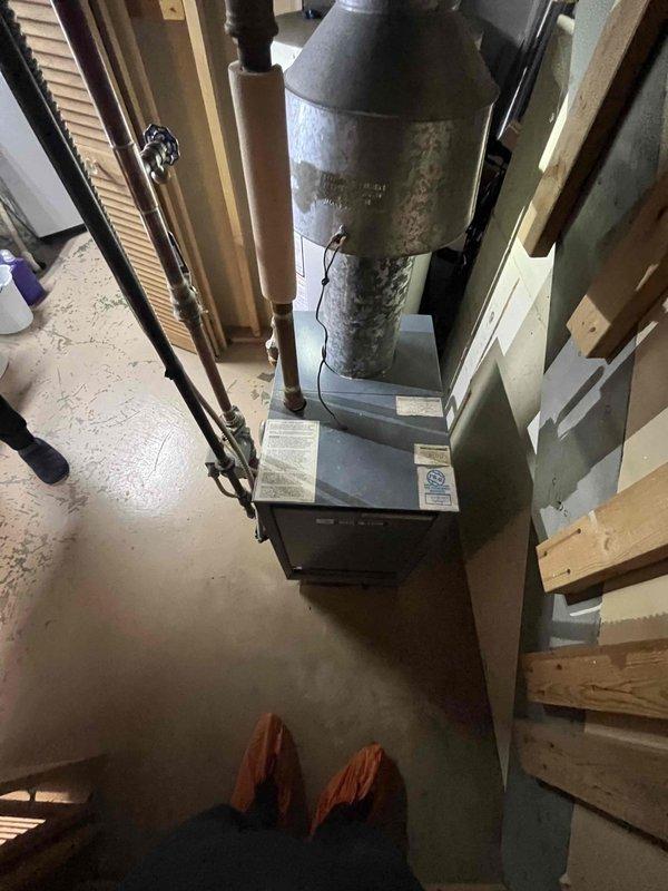 Conducted comprehensive evaluation of existing Lochinvar water heater system and adjacent furnace unit in unfinished mechanical room. Documented current installation configuration, including copper piping network, gas lines, and ventilation components. Assessment completed for potential boiler replacement or system upgrade based on referral request.