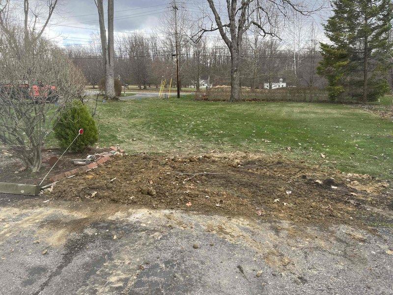 Returned to complete previously sold dig job (iDig #2606904401-000) and utilized electronic detection equipment to locate underground utilities prior to excavation. Prepared site by clearing debris from work area and exposing soil for inspection, with inspector scheduled same-day for verification of completed work.