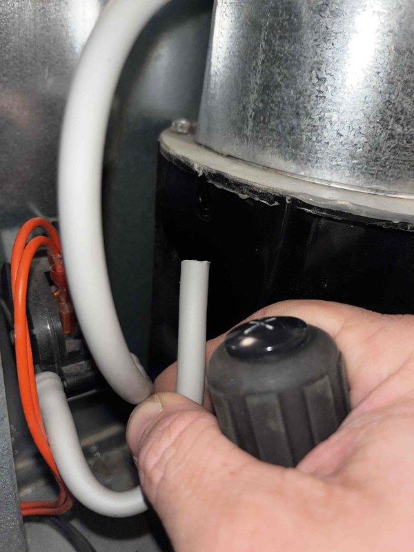 Inspected heat exchanger showing severe corrosion and rust damage consistent with age 10+ years, identified as source of system shutdown issues. Performed manual restart and tested ignition sequence to verify operation. Recommended replacement of heat exchanger due to safety concerns and repeated failure pattern over past two weeks.